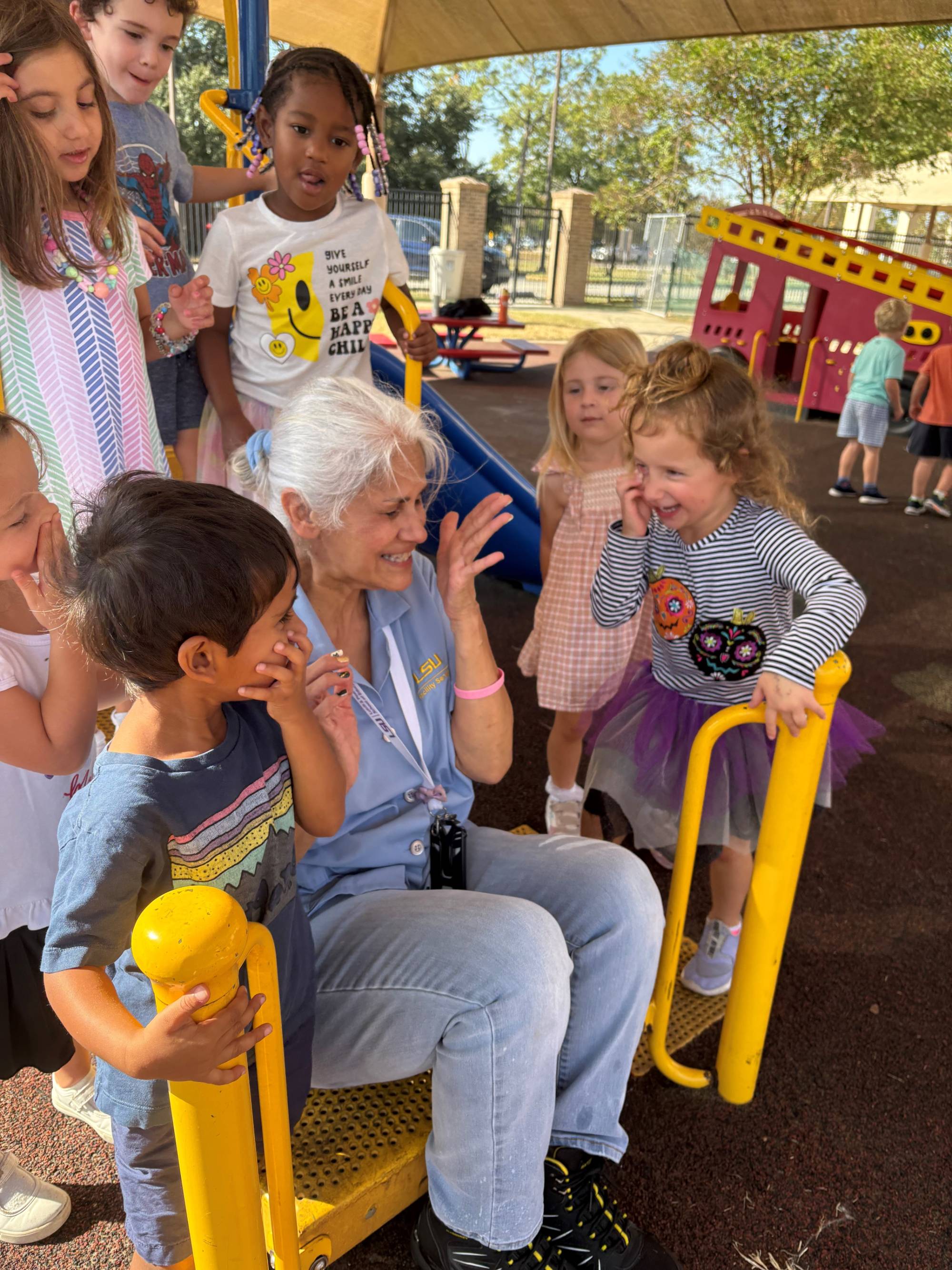 Brenda Finkelstein on the playground with preschool children